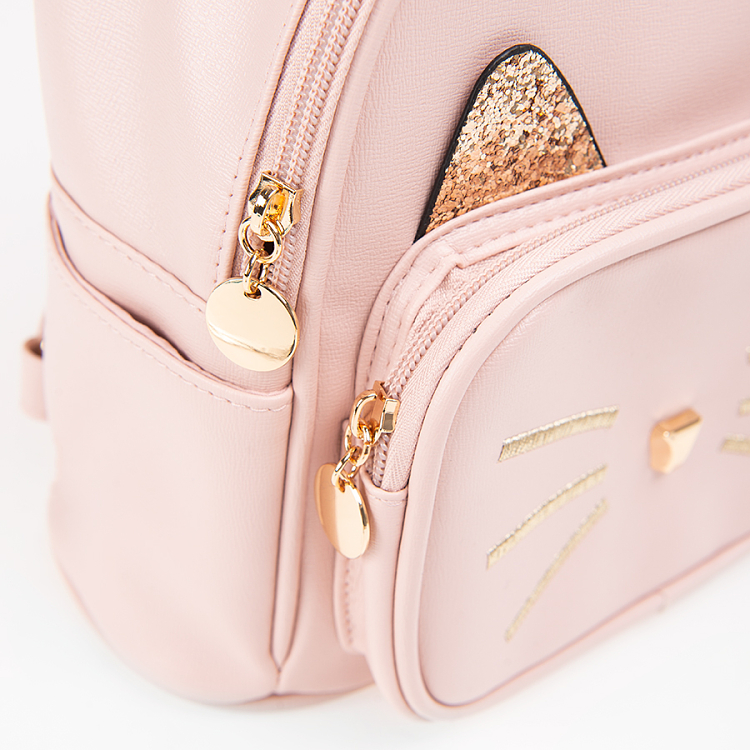 Pink backpack with glod details