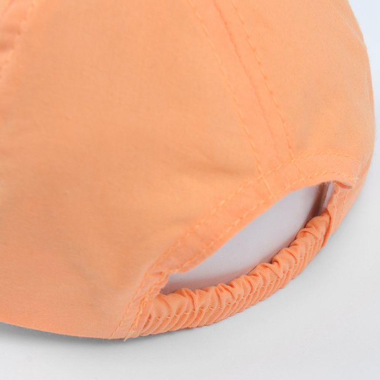 Orange cap with lion print