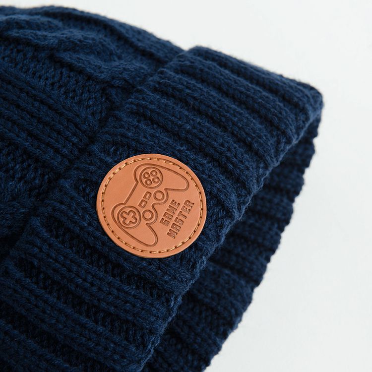 Black hat with yellow pom pom and joystick print