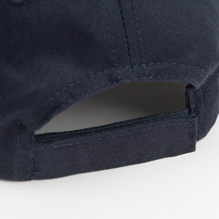 Dark blue jockey hat with small sailing boat print