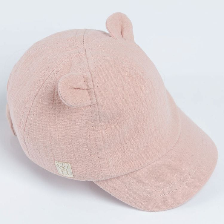 Pink jockey cap with bow on the elastic band and small ears on top
