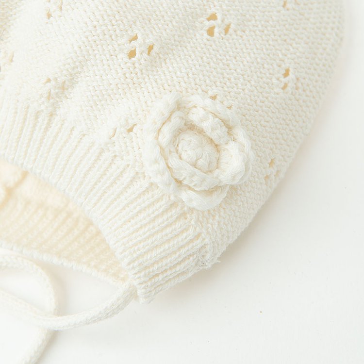 White knit cap with rose applique
