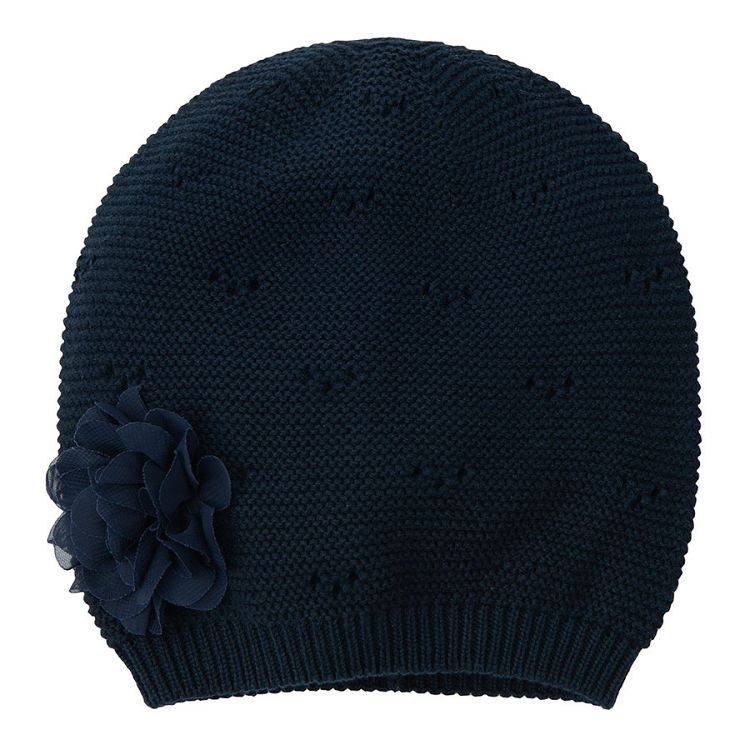 Blue knitted cap with flower applique