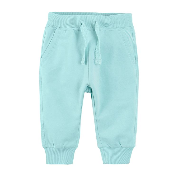 Light blue jogging pants with cord and elastic waist