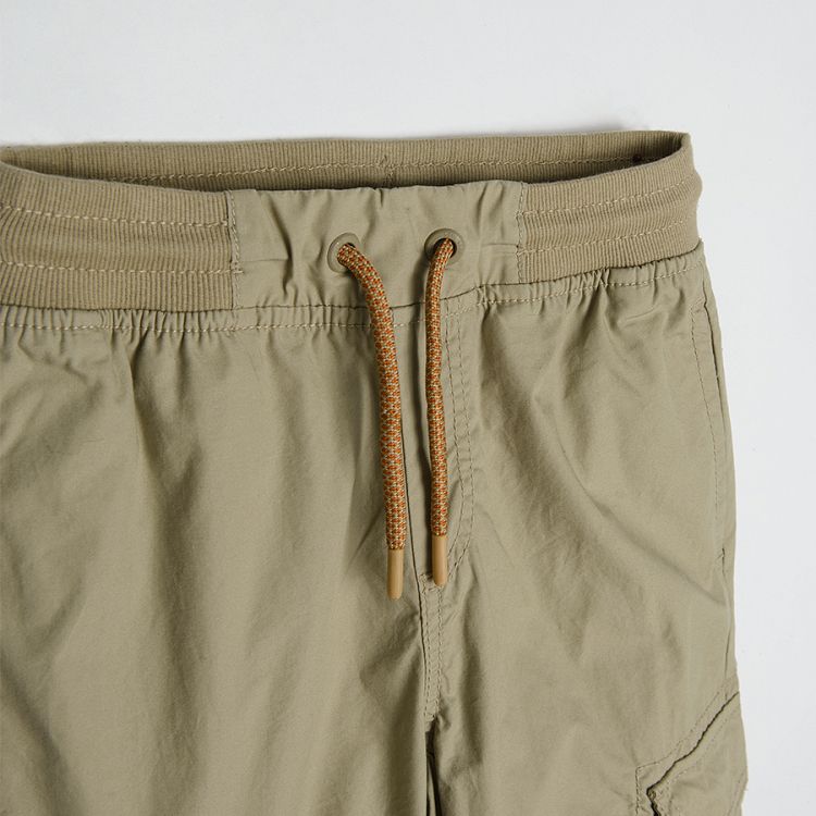 Trousers with cord elastic waist and pockets