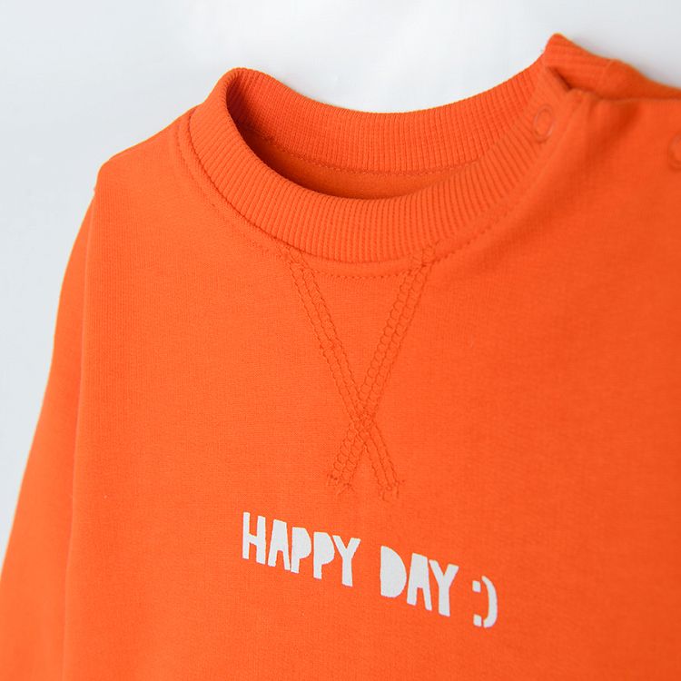 Φούτερ μακρυμάνικο πορτοκαλί με στάμπα "happy day" και μεγάλη τσέπη