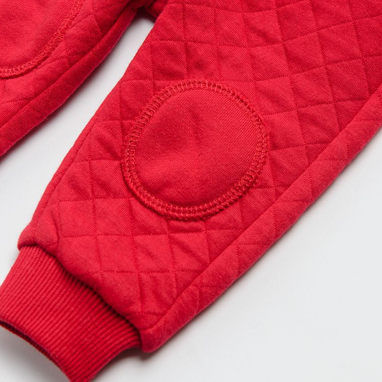 Red jogging pants