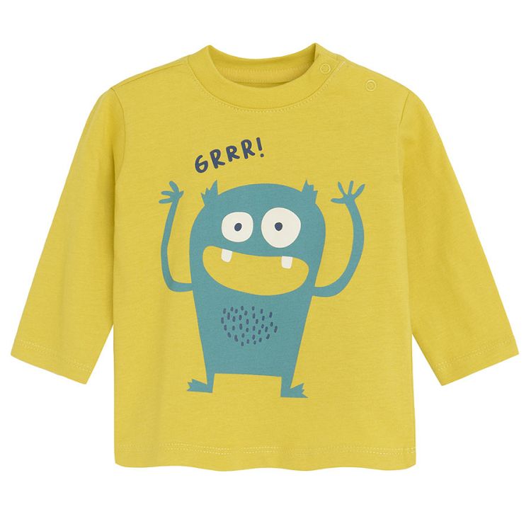 Yellow long sleeve blouse with a cute monster
