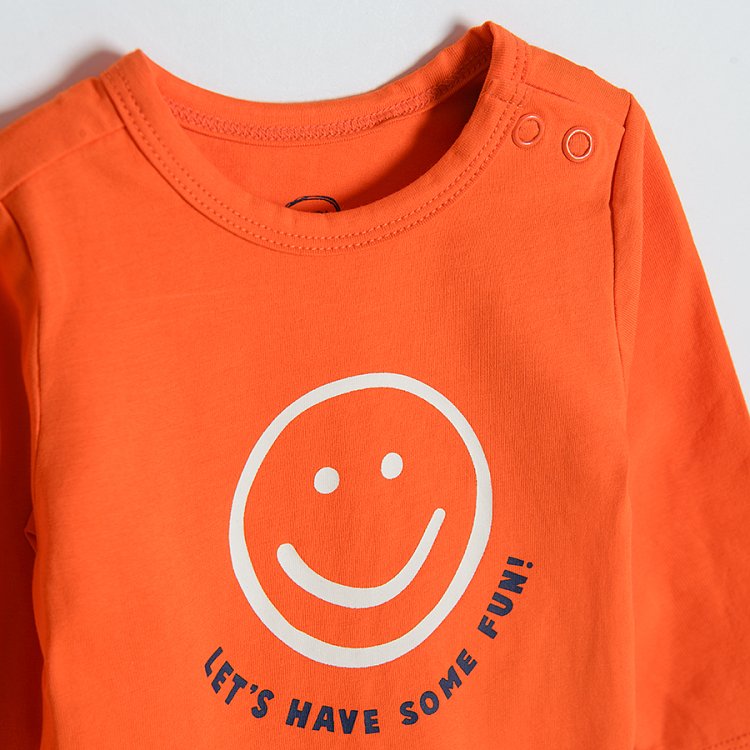 Orange long sleeve bodysuit with happy emoji print