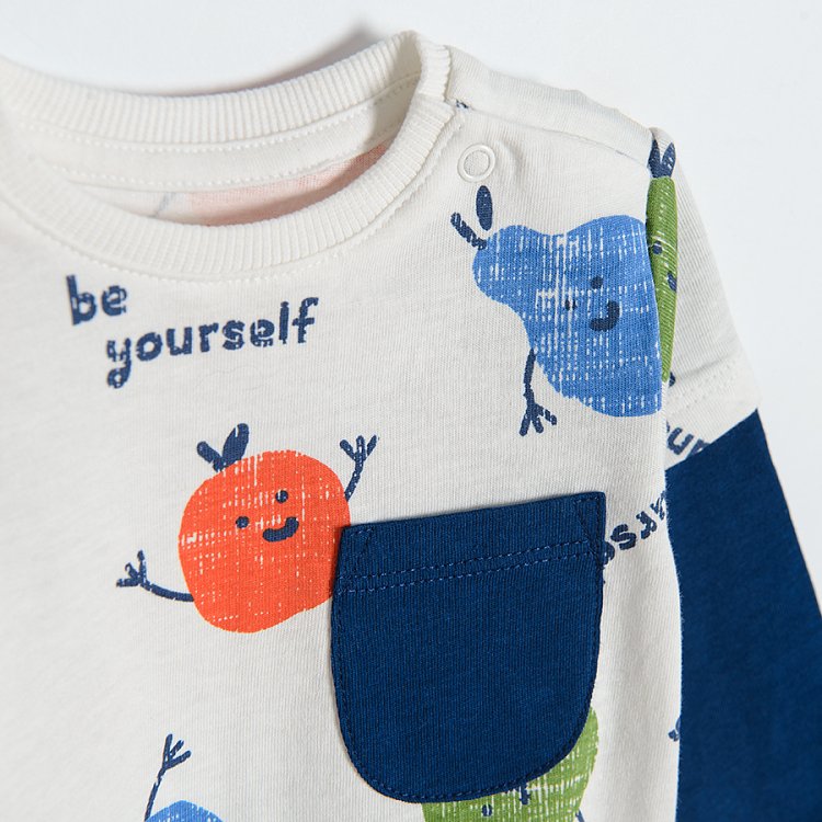 White T-shirt with happy fruits print blue long sleeves and organge jogging pants