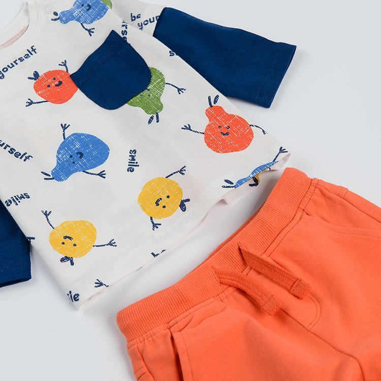 White T-shirt with happy fruits print blue long sleeves and organge jogging pants
