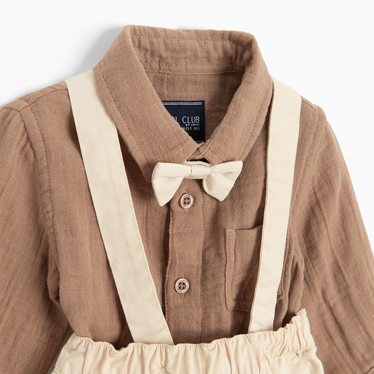 Brown bodysuit with bow tie and ecru pants with suspenders