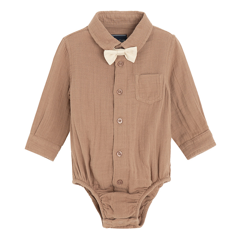 Brown bodysuit with bow tie and ecru pants with suspenders