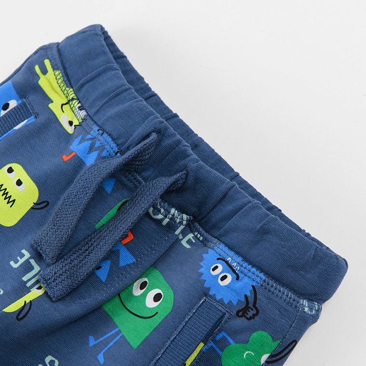 Navy blue jogging pants with happy creatures