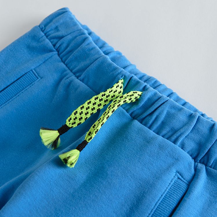 Blue jogging pants with adjustable waist