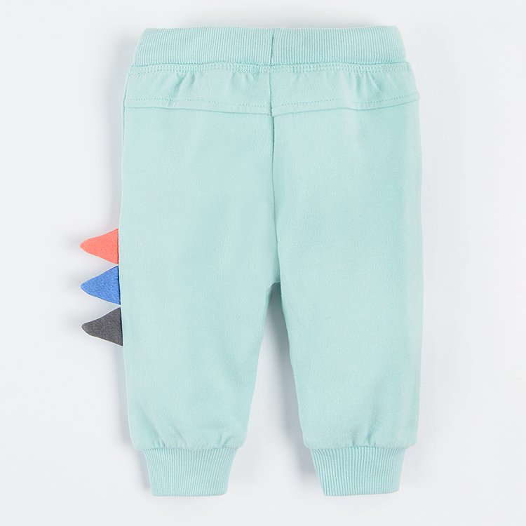 Light mint jogging pants with dinosaur print on the side and adjustable waist