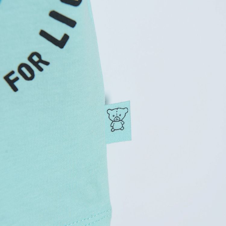 Light mint short sleeve T-shirt with lion print