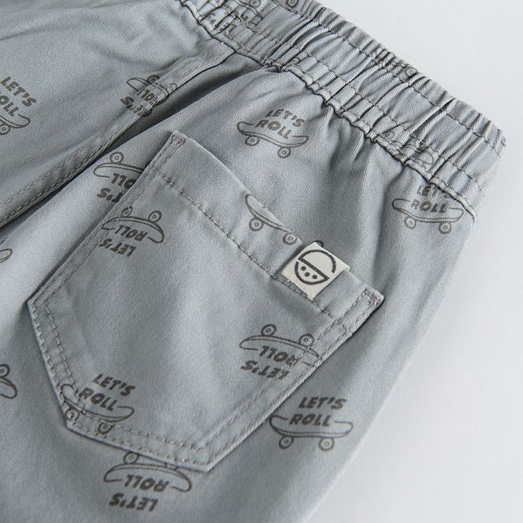 Grey trousers with adjustable waist