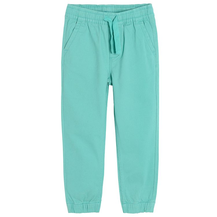Turquoise trousers with adjustable waist