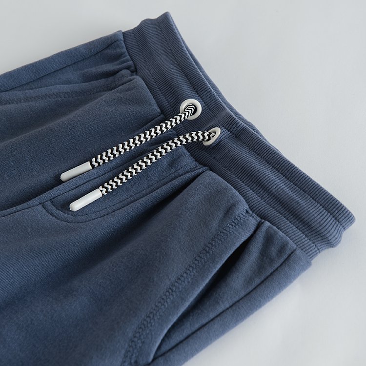 Blue jogging pants with adjustable waist