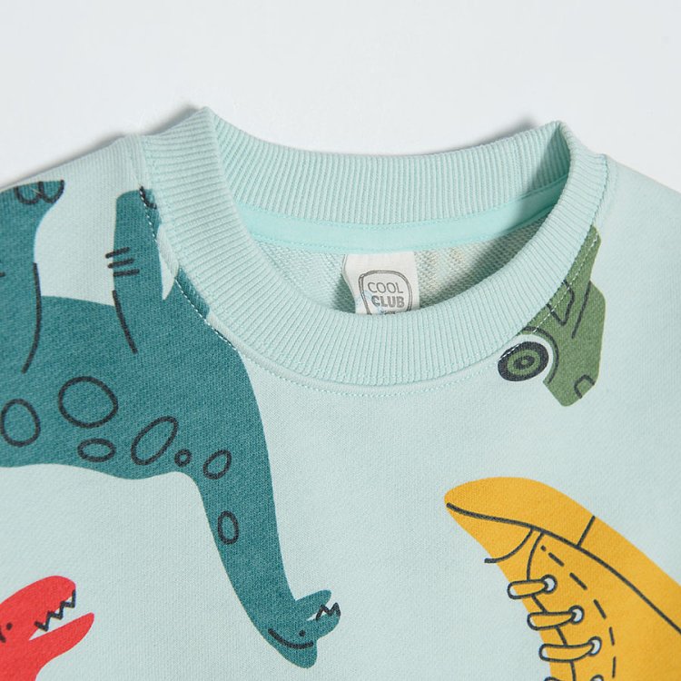 Turquoise sweatshirt with various prints