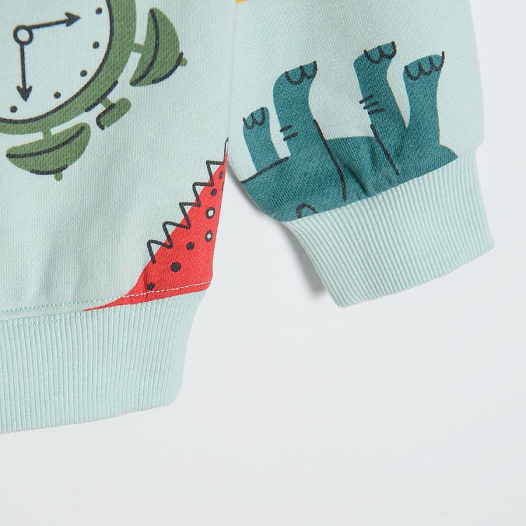 Turquoise sweatshirt with various prints