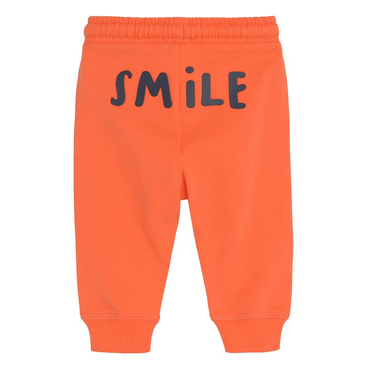 Orange jogging pants