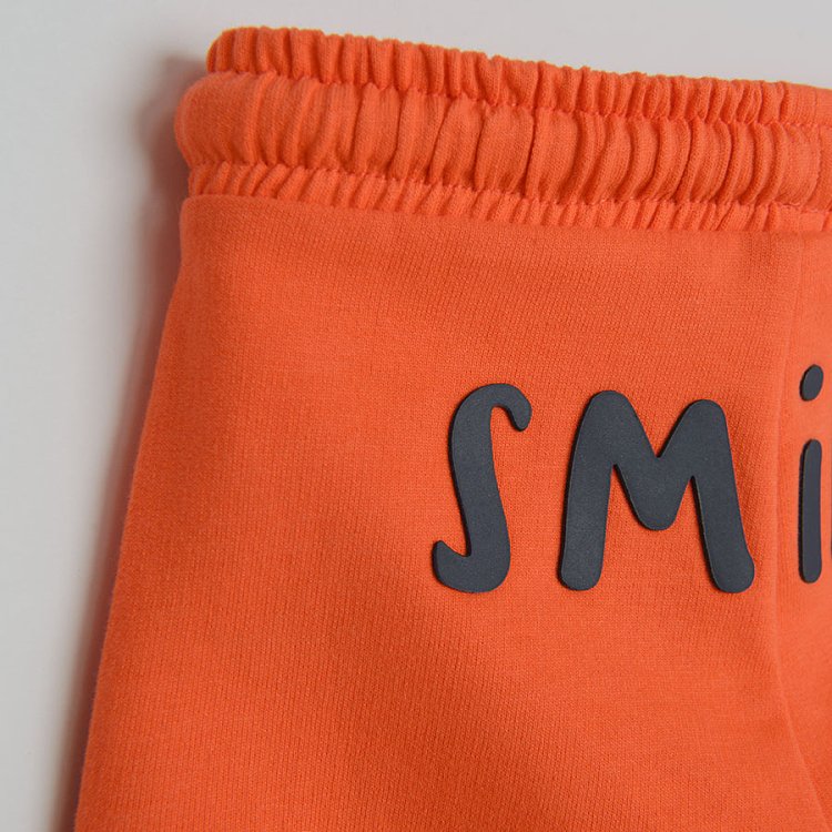 Orange jogging pants