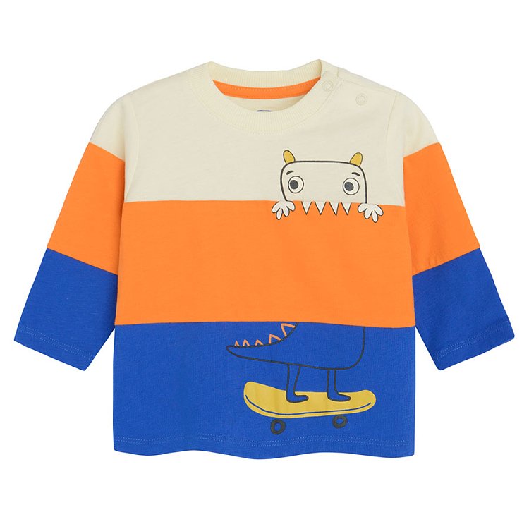 Blue, orange and white long sleeve blouse with dinosaur on skateboard print