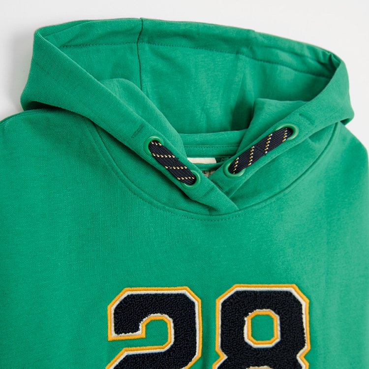 Green hooded seatshirt with number 28 on it