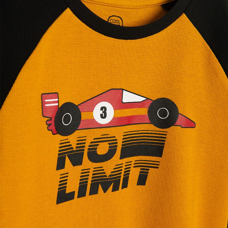 Yellow with black long sleeves and formula1 print