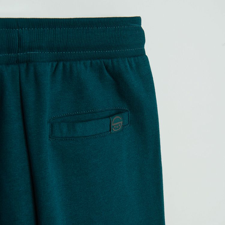 Dark green jogging pants with adjustable waist