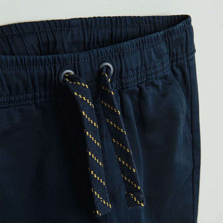 Dark blue trousers with adjustable waist