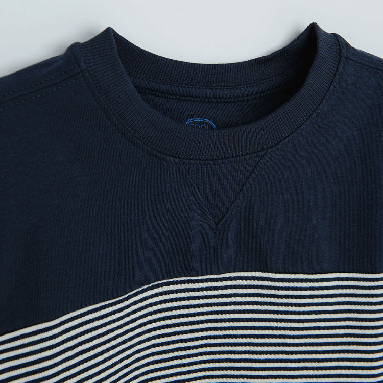 Light blue, white and dark blue striped sweatshirt
