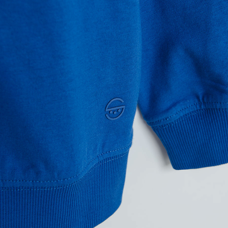 Light blue, white and dark blue striped sweatshirt