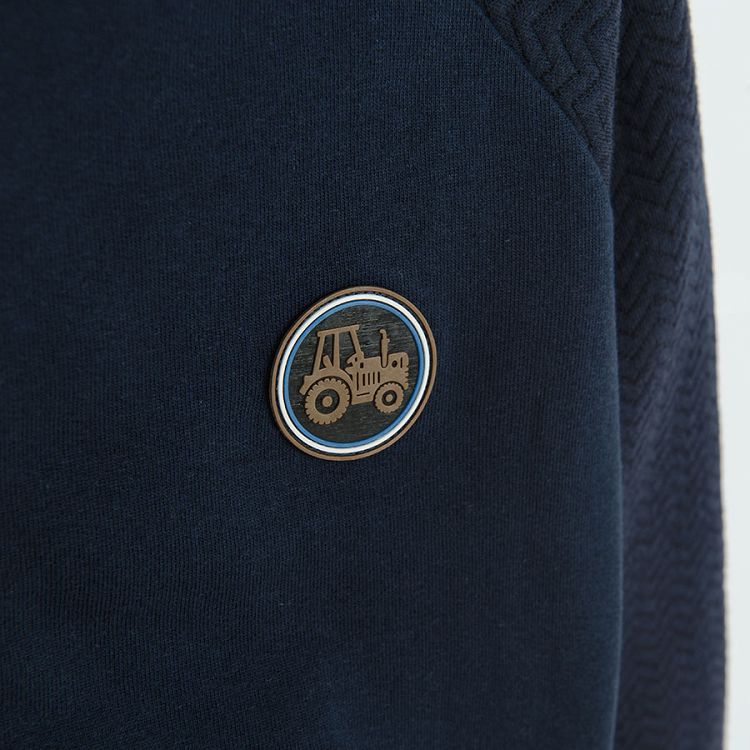 Φούτερ με κουκούλα μπλε σκούρο με επένδυση fleece και στάμπα τρακτερ