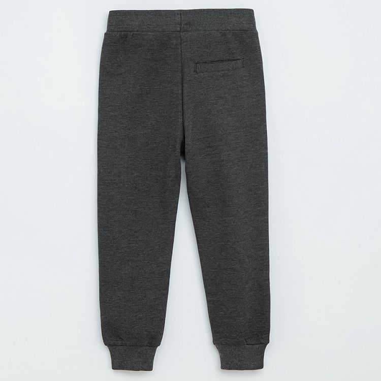 Grey jogging pants with cord on the waist