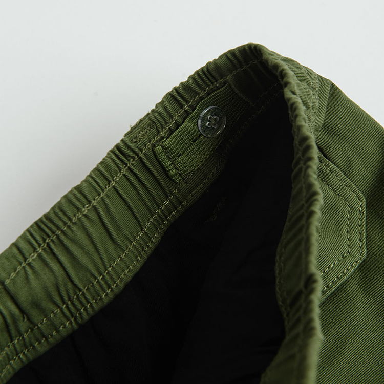 Khaki trousers with side pockets