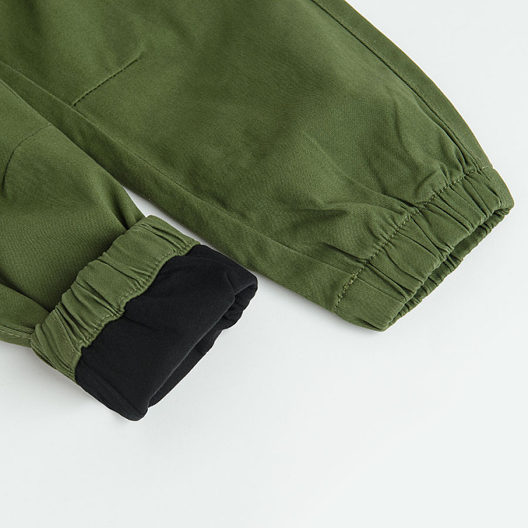 Khaki trousers with side pockets