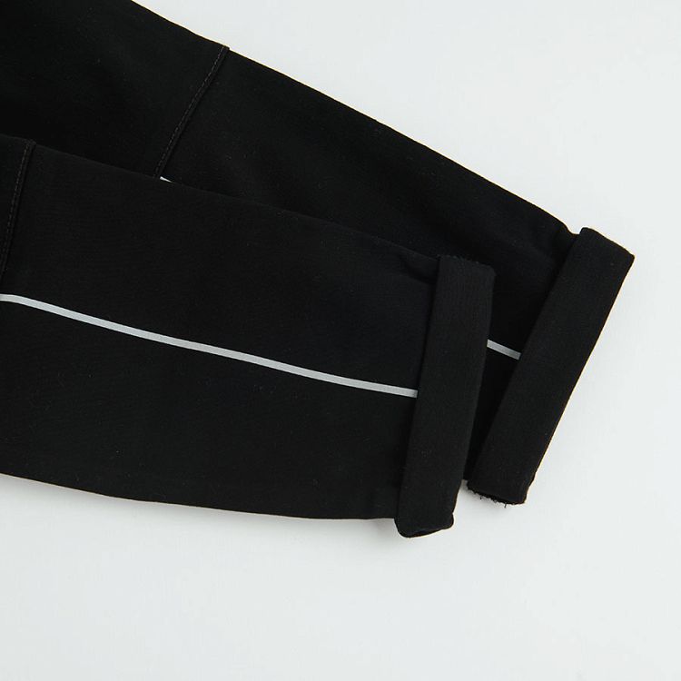 Black trousers with elastic cord on the waist
