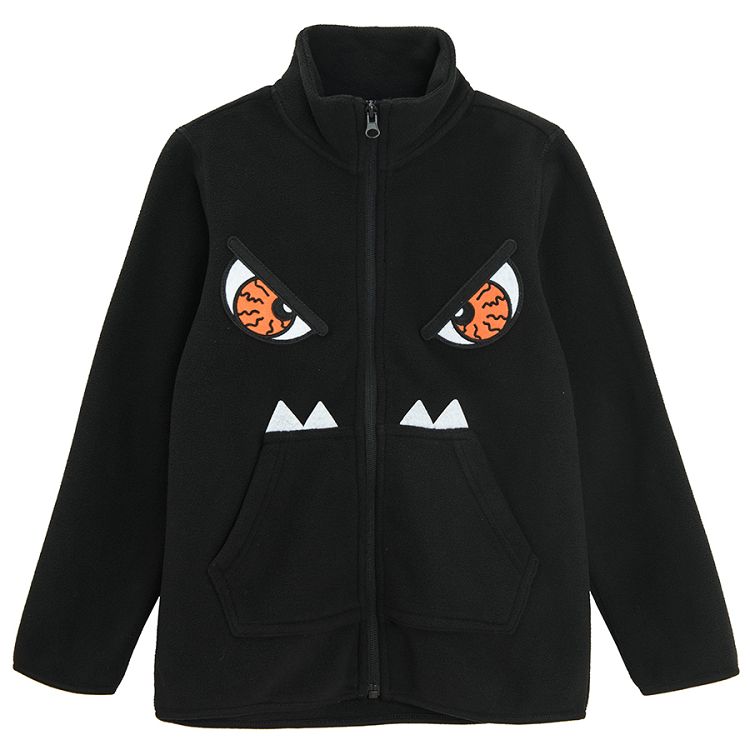Black zip through sweatshirt with monster print and side pockets