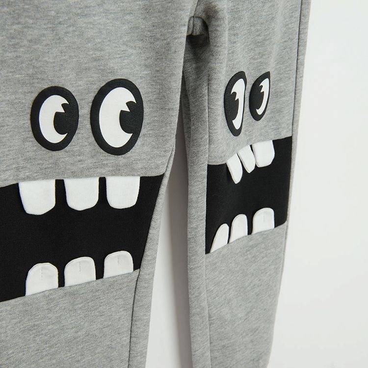 Grey jogging pants with monster print