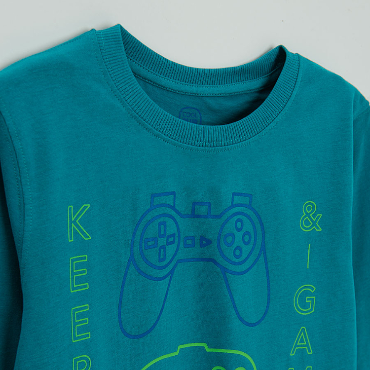 Green long sleeve blouse with gaming print