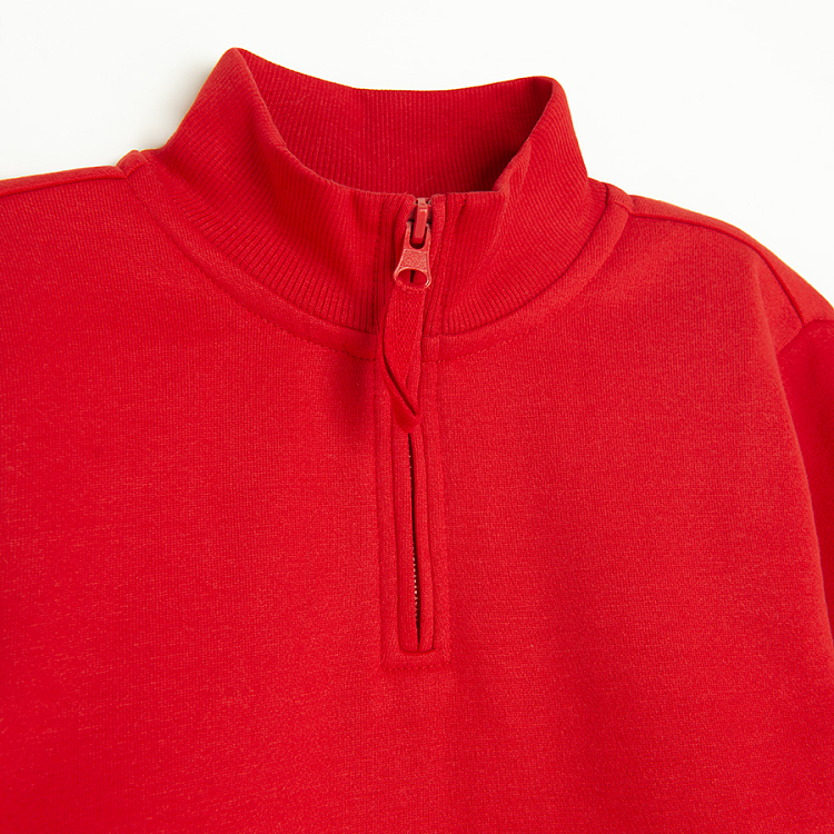 Red sweatshirt with half zipper and side pockets