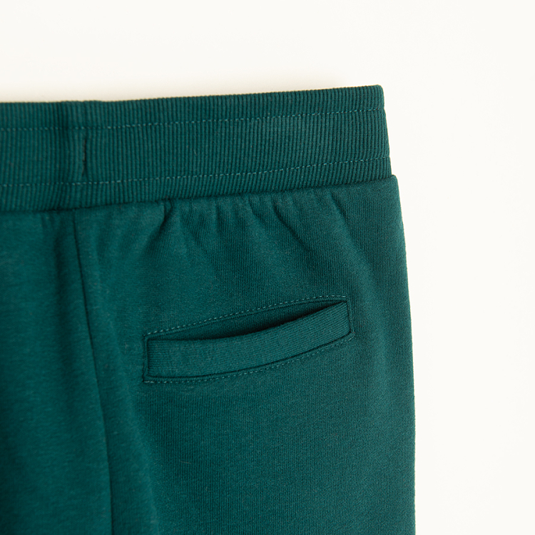 Green jogging pants