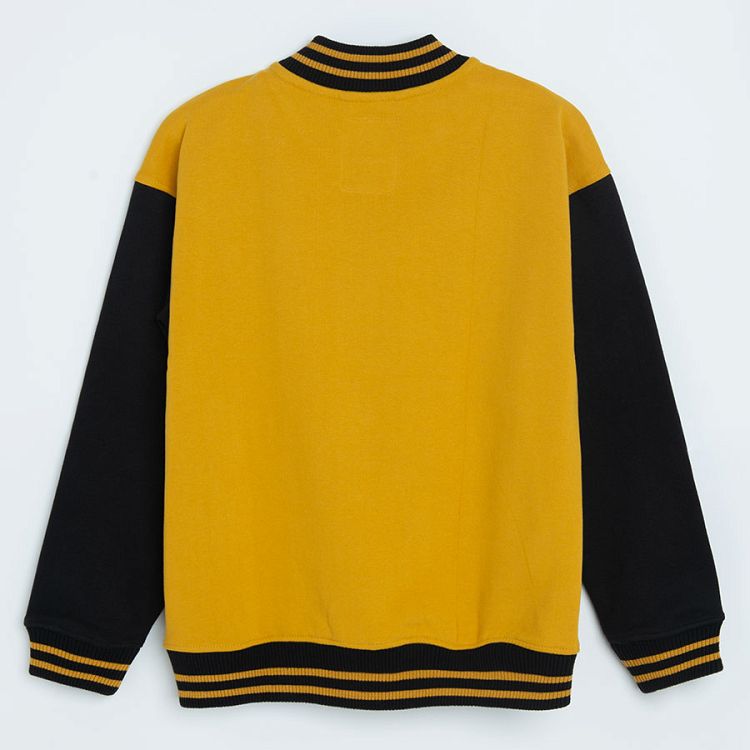 Yellow and black buttons sweatshirt