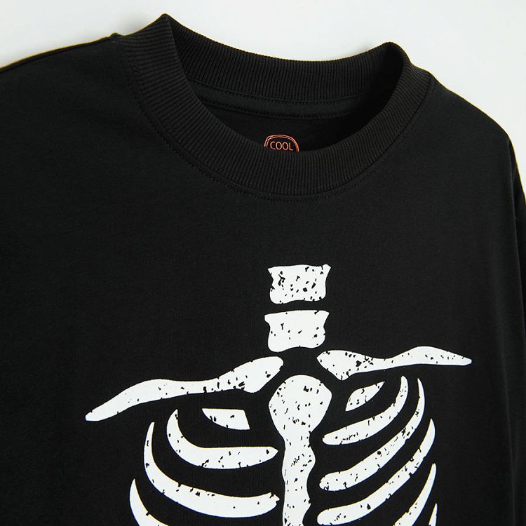 Black long sleeve blouse with skeleton print