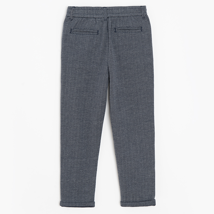 Grey trousers with pleats