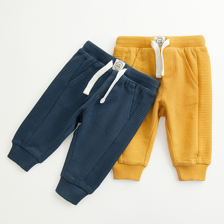 Blue and yellow sweatapants with cord