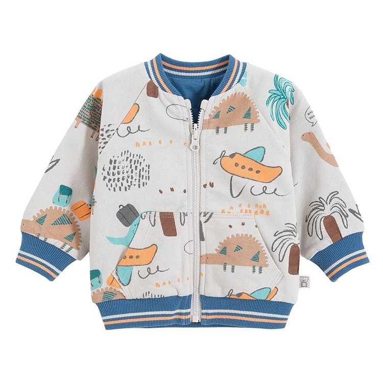 Blue and reversible ecru with dinosaurs print zip through sweatshirt